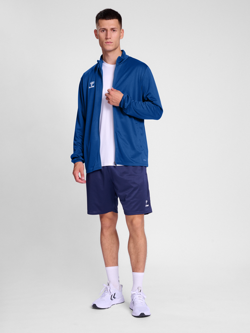hmlESSENTIAL TRACK JACKET, TRUE BLUE, model
