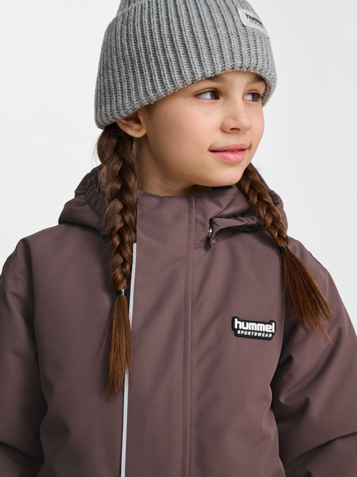 hmlJR SNOWSUIT WP 10K, PEPPERCORN, model