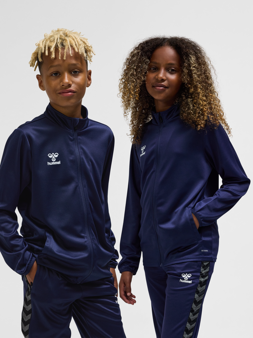 hmlESSENTIAL TRACK JACKET KIDS, MARINE, model