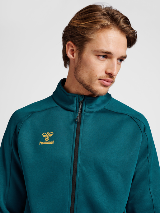 hmlCIMA XK ZIP JACKET, BLUE CORAL, model