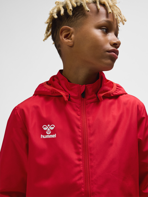 hmlESSENTIAL AW JACKET KIDS, TRUE RED, model